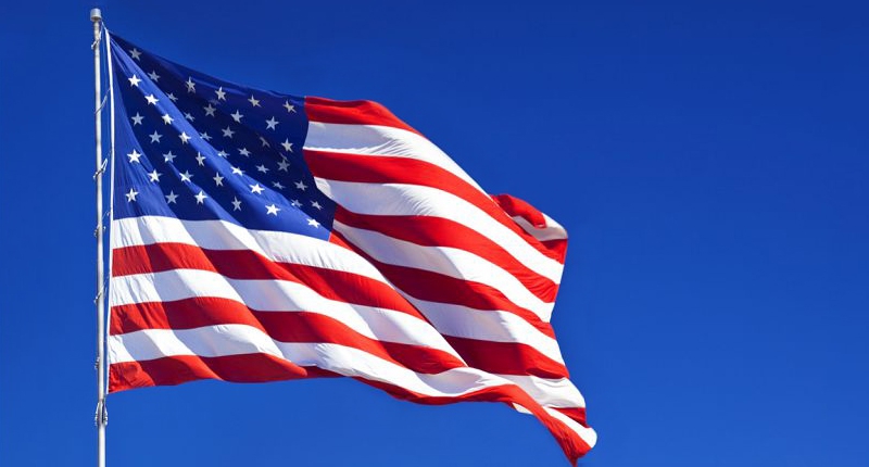 US flag in the sky fluttering in the wind