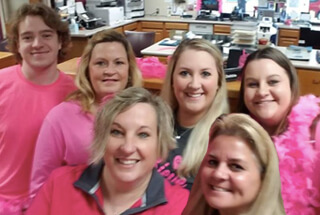 First Citizens employees dressed in pink shirts