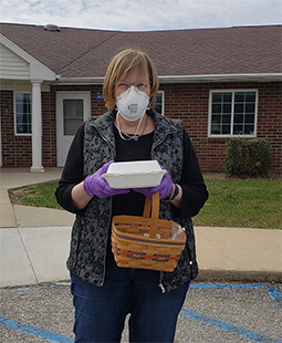 Jane delivering meals on wheels