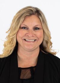 Andrea Fix in dark suit