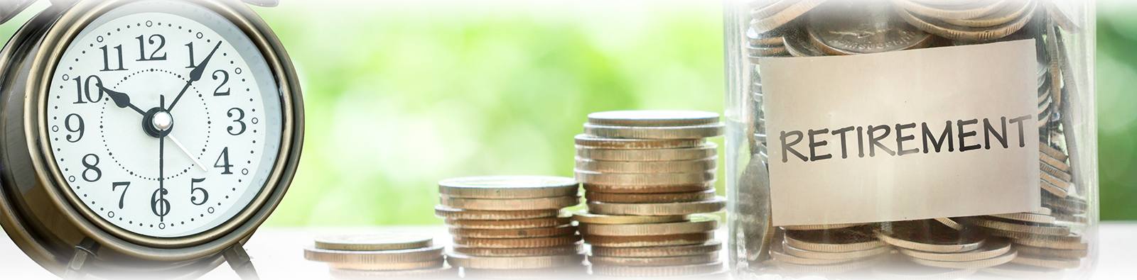 old clock with jar of coins for retirement savings